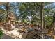 Outdoor patio with stone fireplace and seating area at 3601 Ocean Blvd. N, Myrtle Beach, SC 29577
