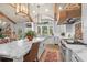 Spacious kitchen with exposed beams, marble island, and high-end appliances at 3601 Ocean Blvd. N, Myrtle Beach, SC 29577