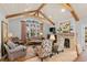 Open living area with hardwood floors, large windows, and cozy seating arrangement at 3601 Ocean Blvd. N, Myrtle Beach, SC 29577