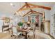 Bright dining room with hardwood floors, chandelier, and elegant furnishings at 3601 Ocean Blvd. N, Myrtle Beach, SC 29577