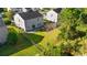 Aerial view showcasing home's backyard, fenced yard, and firepit at 2248 Beauclair Ct., Myrtle Beach, SC 29579