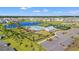 Aerial view of community pool, tennis courts, and surrounding neighborhood at 2248 Beauclair Ct., Myrtle Beach, SC 29579