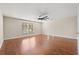 Large bedroom with hardwood floors and two windows at 2248 Beauclair Ct., Myrtle Beach, SC 29579