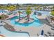 Community pool with lazy river, shade structures, and lounge chairs at 2248 Beauclair Ct., Myrtle Beach, SC 29579