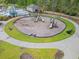 Circular playground with slides and play structures at 2248 Beauclair Ct., Myrtle Beach, SC 29579