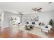 Spacious living room with hardwood floors, two ceiling fans, and a neutral color palette at 2248 Beauclair Ct., Myrtle Beach, SC 29579
