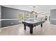Dining area with pool table and view into the kitchen at 2248 Beauclair Ct., Myrtle Beach, SC 29579
