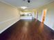 Spacious living room with dark hardwood floors and lots of natural light at 4819 Orchid Way # 104, Myrtle Beach, SC 29577