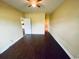 Large bedroom with dark hardwood floors and neutral-colored walls at 4819 Orchid Way # 104, Myrtle Beach, SC 29577