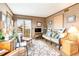Bright living room with ocean views and comfy seating at 1582 S Waccamaw Dr. # 60, Garden City Beach, SC 29576