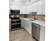 Updated kitchen, featuring stainless steel appliances and white cabinets at 421 Cambridge Circle # F8, Murrells Inlet, SC 29576