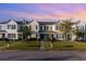 Two story townhome with welcoming front porch and landscaping at 893 Barn Owl Ct. # 893, Myrtle Beach, SC 29579