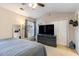 Main bedroom with large bed, dresser, and ample closet space at 893 Barn Owl Ct. # 893, Myrtle Beach, SC 29579