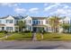 Attractive two story townhome with welcoming front porch and landscaping at 893 Barn Owl Ct. # 893, Myrtle Beach, SC 29579