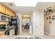 Well-equipped kitchen featuring dark wood cabinets and black appliances at 893 Barn Owl Ct. # 893, Myrtle Beach, SC 29579