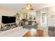 Bright living room with large TV, couches, and a coffee table at 893 Barn Owl Ct. # 893, Myrtle Beach, SC 29579