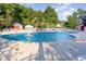 Refreshing pool with mushroom fountain and lounge chairs at 893 Barn Owl Ct. # 893, Myrtle Beach, SC 29579