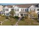 Aerial view of charming townhome community, showcasing manicured lawns and landscaping at 893 Barn Owl Ct. # 893, Myrtle Beach, SC 29579