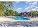 Large community pool with plenty of lounge chairs at 893 Barn Owl Ct. # 893, Myrtle Beach, SC 29579