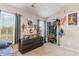 Spacious bedroom with large dresser, closet, and sports memorabilia at 893 Barn Owl Ct. # 893, Myrtle Beach, SC 29579