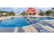 Relaxing kidney-shaped pool with plenty of lounge chairs at 893 Barn Owl Ct. # 893, Myrtle Beach, SC 29579
