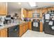 Well-equipped kitchen with ample cabinetry, modern appliances and a breakfast bar at 893 Barn Owl Ct. # 893, Myrtle Beach, SC 29579