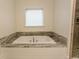 Soaking tub with granite countertop at 119 Cockle Shell Ct., Pawleys Island, SC 29585