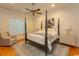 Spacious bedroom with a large four-poster bed at 119 Cockle Shell Ct., Pawleys Island, SC 29585