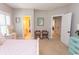 Comfortable bedroom with two chairs and access to a bathroom at 119 Cockle Shell Ct., Pawleys Island, SC 29585