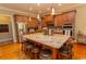 Modern kitchen with large island, granite countertops, and stainless steel appliances at 119 Cockle Shell Ct., Pawleys Island, SC 29585