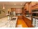 Well-equipped kitchen with granite countertops and ample cabinetry at 119 Cockle Shell Ct., Pawleys Island, SC 29585