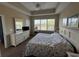 Spacious bedroom with king-size bed and scenic views at 5801 Oyster Catcher Dr. # 1531, North Myrtle Beach, SC 29582