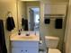 Small bathroom with sink, toilet, and linen cabinet at 5801 Oyster Catcher Dr. # 1531, North Myrtle Beach, SC 29582