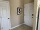 Simple entryway with white door and nautical decor at 5801 Oyster Catcher Dr. # 1531, North Myrtle Beach, SC 29582