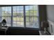 Bedroom window showcases a picturesque view of a golf course at 5801 Oyster Catcher Dr. # 1531, North Myrtle Beach, SC 29582