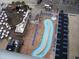 Unique shaped pool with plenty of lounge chairs at 9550 Shore Dr. # 1405, Myrtle Beach, SC 29572