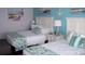 Two beds, coastal decor, and ocean themed bedding at 9550 Shore Dr. # 1405, Myrtle Beach, SC 29572