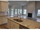 Spacious kitchen boasts an island with granite countertops and stainless steel appliances at Lot 721 Zoe Way, Myrtle Beach, SC 29588