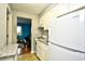 Small kitchen featuring white appliances and granite at 120 North Dogwood Dr. # 113, Garden City Beach, SC 29576