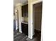 Dark wood cabinets and granite countertops in kitchen at 8750 W Highway 19, Loris, SC 29569
