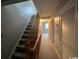 Upstairs hall with staircase and doors to bedrooms at 1210 Pinegrove Dr. # G, Myrtle Beach, SC 29577