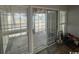 Sunroom with sliding glass doors and view to backyard at 1210 Pinegrove Dr. # G, Myrtle Beach, SC 29577