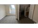 Bedroom with window, closet, and carpet flooring at 1210 Pinegrove Dr. # G, Myrtle Beach, SC 29577