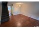 Spacious dining room with wood floors and staircase at 1210 Pinegrove Dr. # G, Myrtle Beach, SC 29577