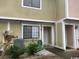 Townhome entrance with landscaping and parking at 1210 Pinegrove Dr. # G, Myrtle Beach, SC 29577