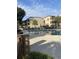 Community swimming pool with surrounding patio furniture at 501 Maison Dr. # G15, Myrtle Beach, SC 29572