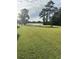 Scenic waterfront view with lush green lawn at 501 Maison Dr. # G15, Myrtle Beach, SC 29572