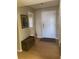 Entryway with wood floors and storage bench at 501 Maison Dr. # G15, Myrtle Beach, SC 29572