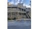 Exterior view of multi-level building with balconies and parking at 501 Maison Dr. # G15, Myrtle Beach, SC 29572