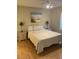 Bright bedroom with a queen-size bed and two nightstands at 501 Maison Dr. # G15, Myrtle Beach, SC 29572